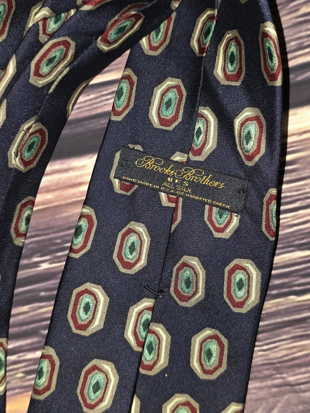 Brooks Brothers Navy Tie with Green and Gold Medallions